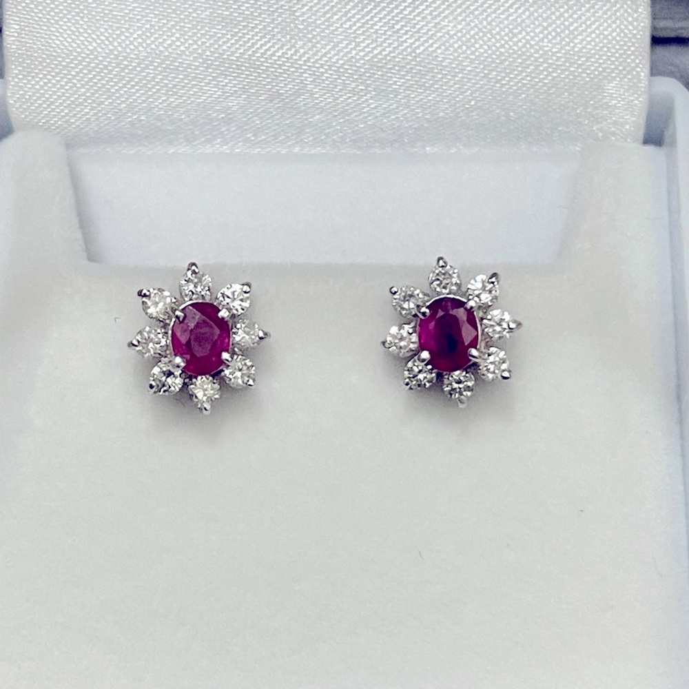 Ruby earrings. 0.33 Ct ruby each, 0.47 Ct diamonds each. Approx 7 gram